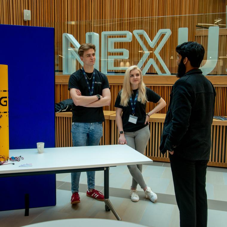 Young people giving a talk